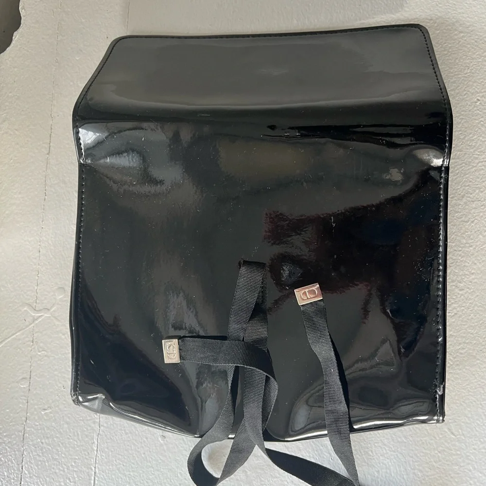 Dior Glossy Black Makeup Bag with Ribbon Detail.